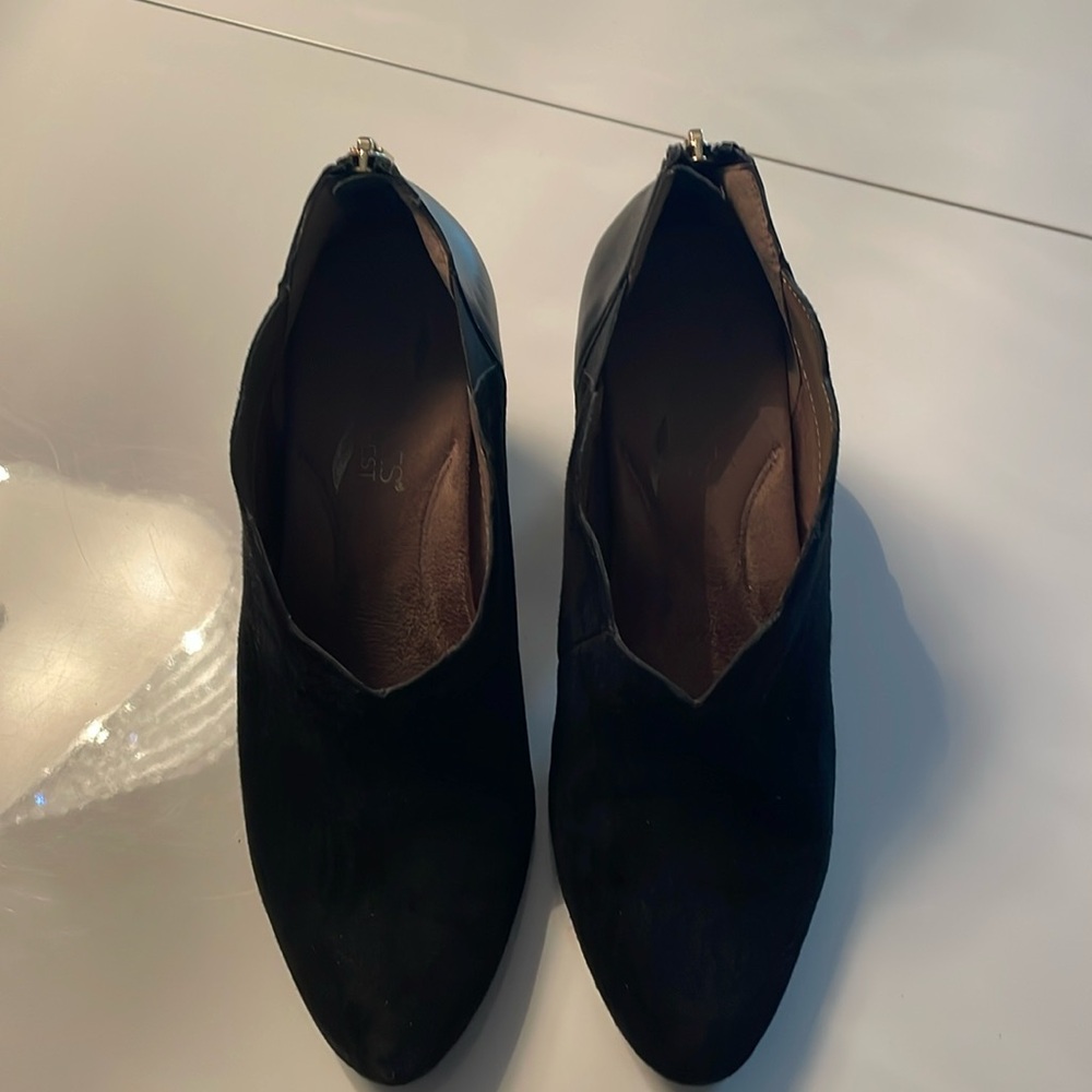 Aersoles booties , black leather and suede . Back zipper size 7 1/2